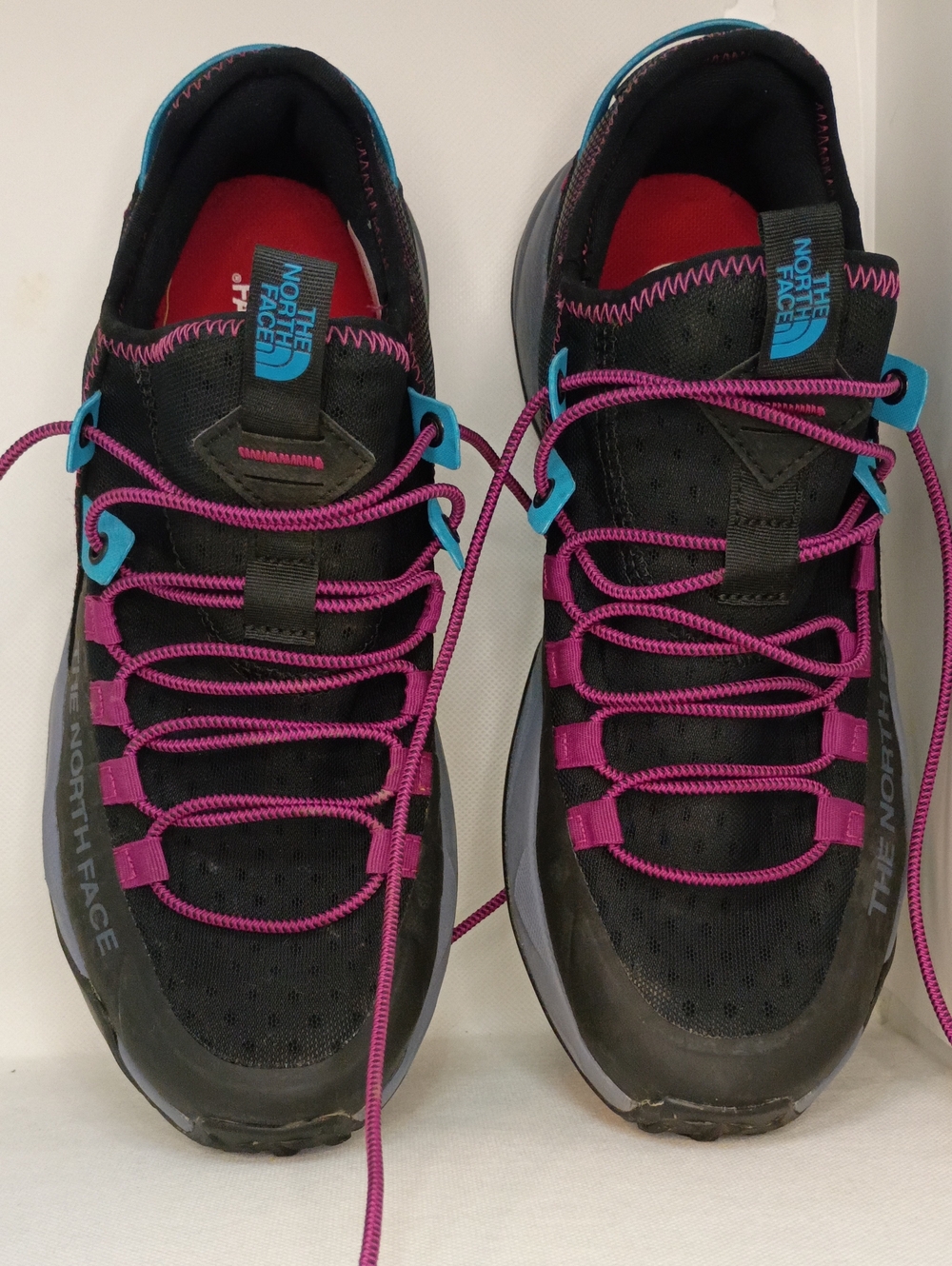 The North Face Women’s Black Athletic Shoes with Pink Laces and Teal Accents